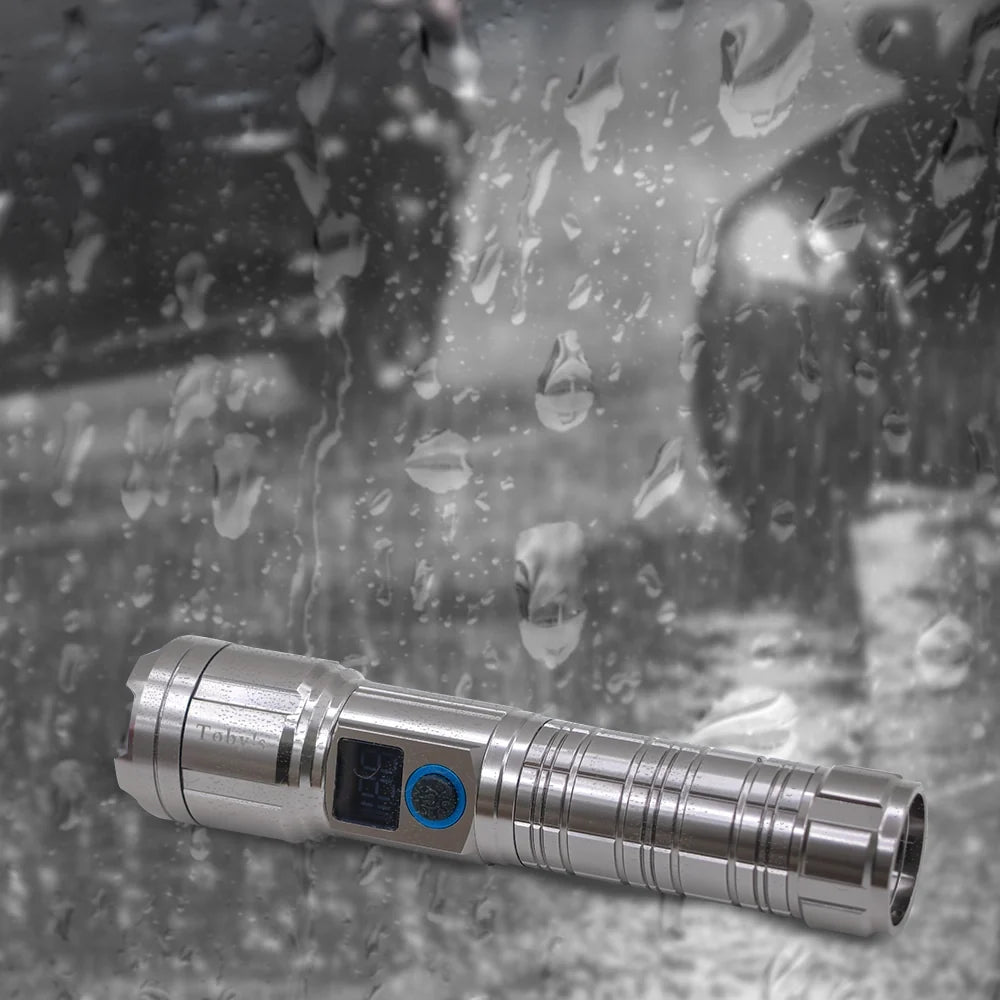 Toby's Torch 85 rugged flashlight in wet outdoor conditions